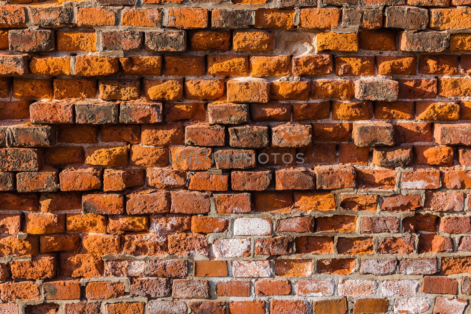 Level red brick wall background.