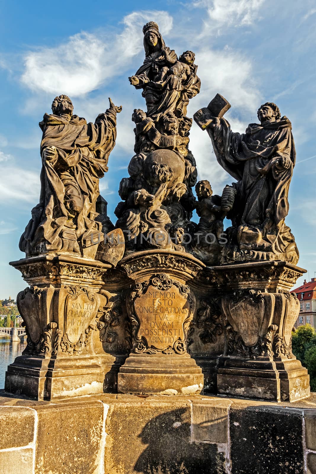 Sculpture of Virgin Mary surrounded by the Saints on the Charles Bridge in Prague, the capital of the Czech Republic on the Vltava River, home to many cultural attractions.