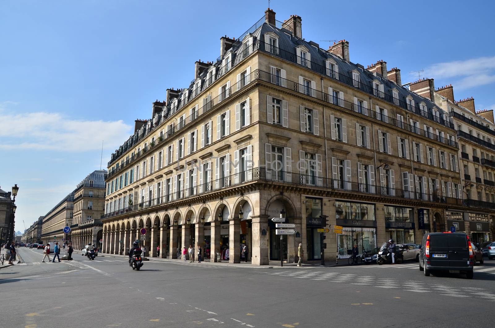 Paris, France - May 13, 2015: Tourists visit the center of Paris on May 13, 2015. Paris is the home of the most visited art museum in the world.