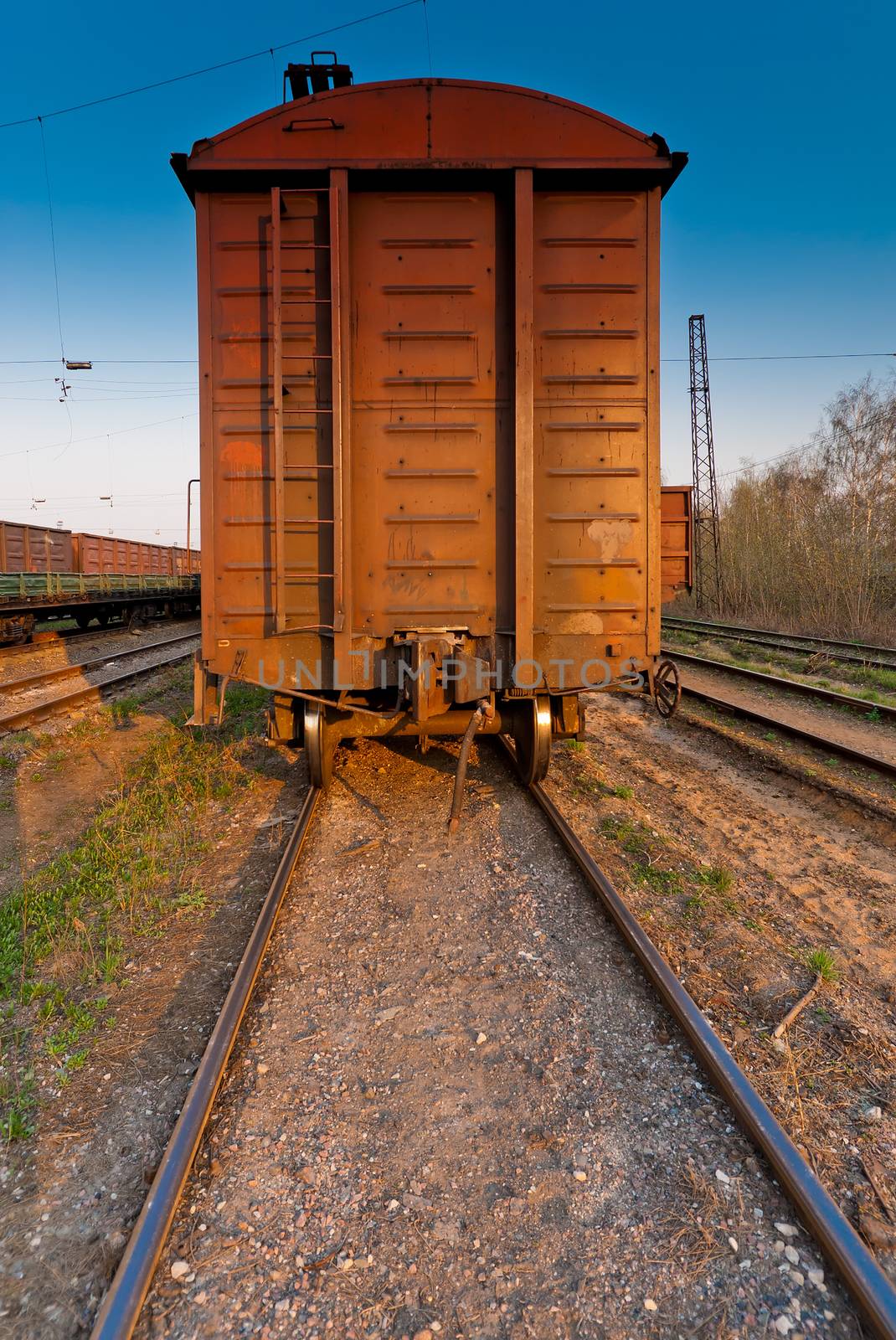 wagon of a freight train on the railroad by kosmsos111