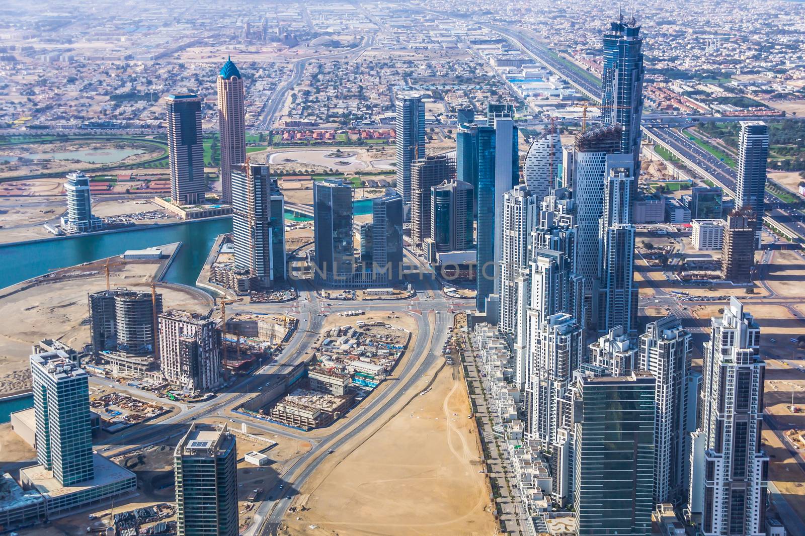 Downtown Dubai, UAE, on February 3, 2013, out of observation deck of Burj Khalifa. Dominating on the right, twin towers of the JW Marriott Marquis, the tallest hotel in town.