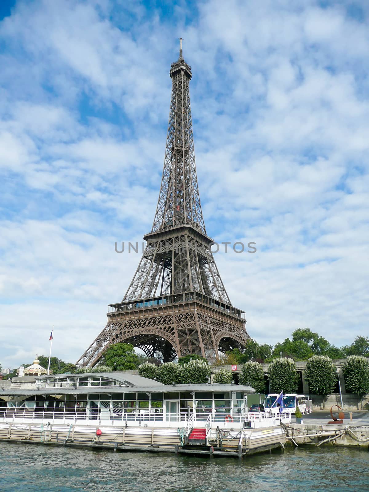 Eiffel Tower against a scenic cloudy sky, Paris by marcorubino
