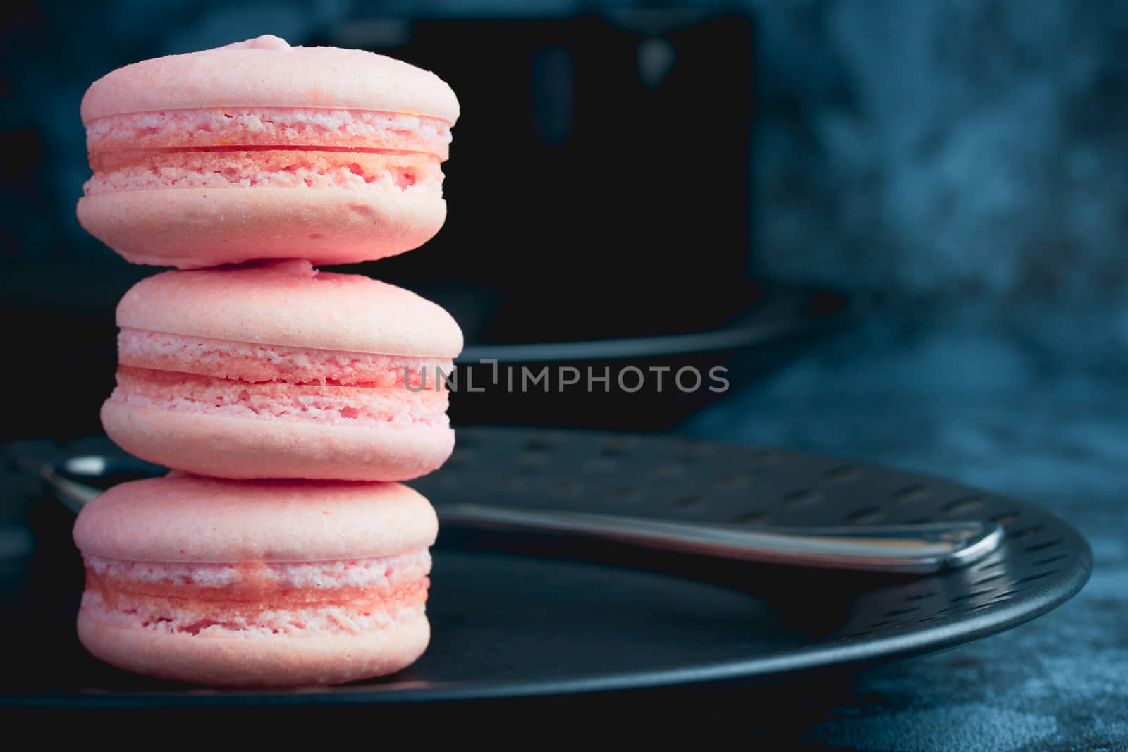 French pink sweet macaroons close up