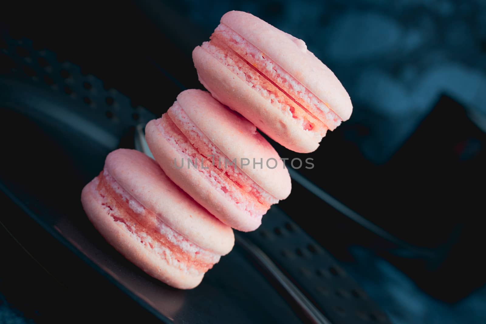 French pink sweet macaroons close up