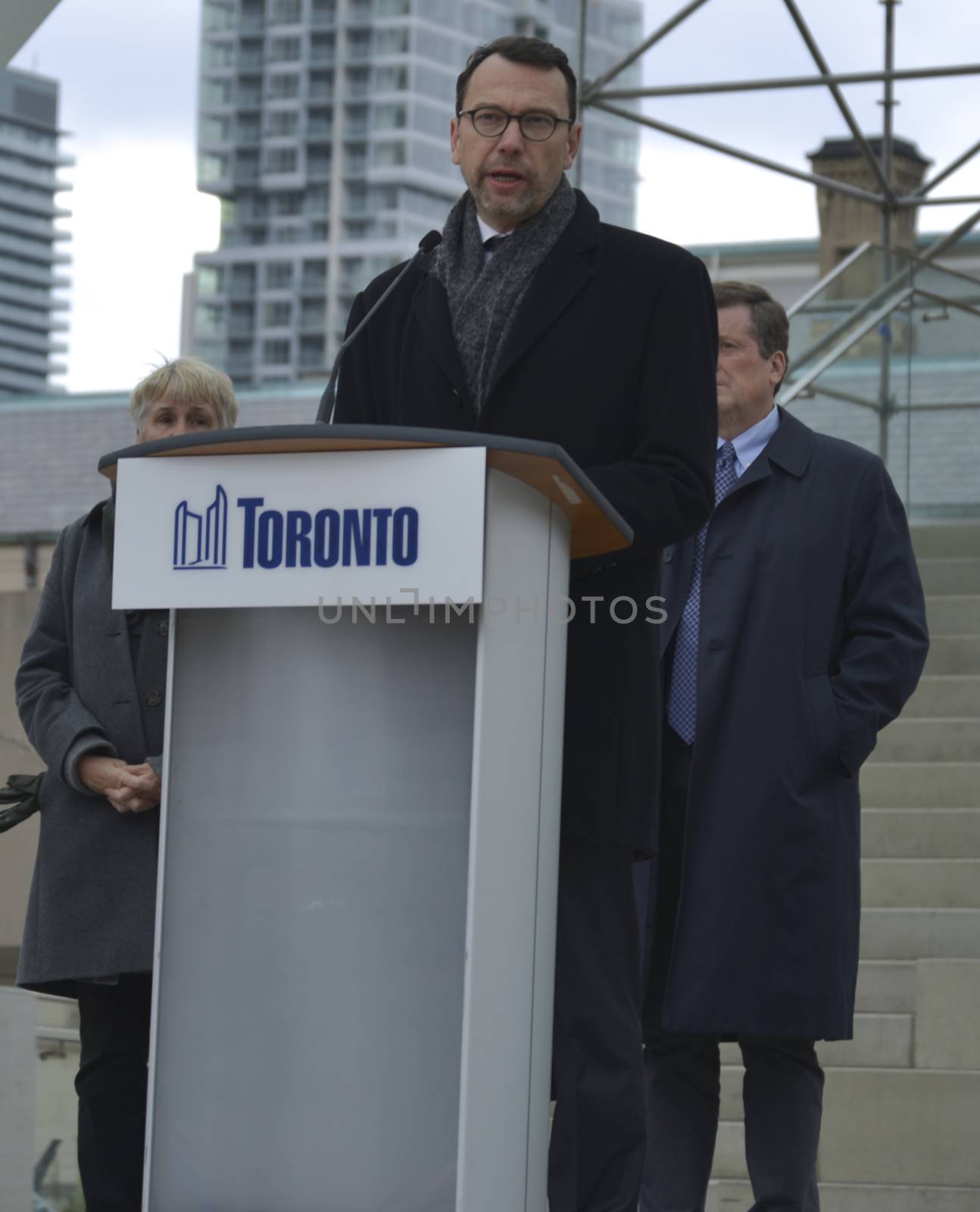 CANADA, Toronto: Consul General of France Marc Trouyet addresses hundreds gathered at Nathan Phillips Square in Toronto on November 14, 2015, a day after a series of terror attacks in Paris. Islamic State has claimed responsibility for the attacks, which killed at least 129 people and left hundreds more injured in scenes of carnage at a concert hall, restaurants and the national stadium on Friday, November 13.