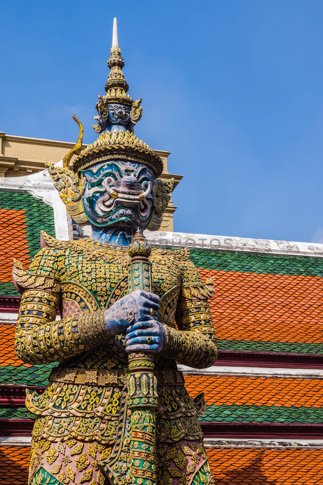 Giant guardian demon statue at The Grand Palace complex in Bangkok, Thailand.