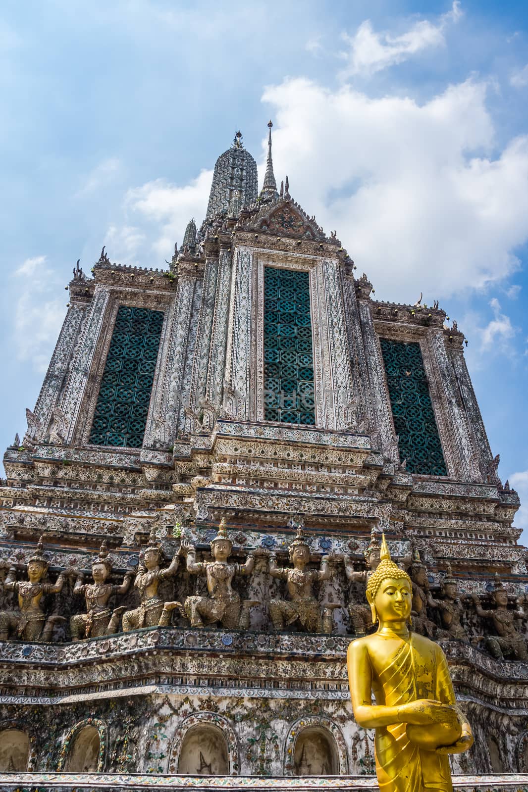 Buddha’s statue at the  Wat Arun, Temple of Dawn in Bangkok, Thailand.