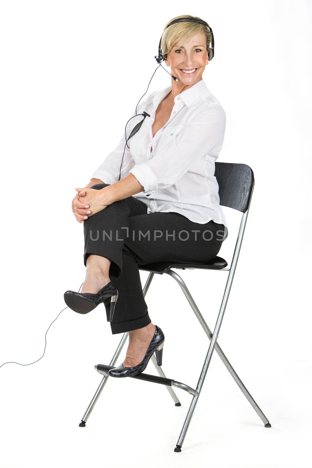 manager woman talking with the headsets by Flareimage