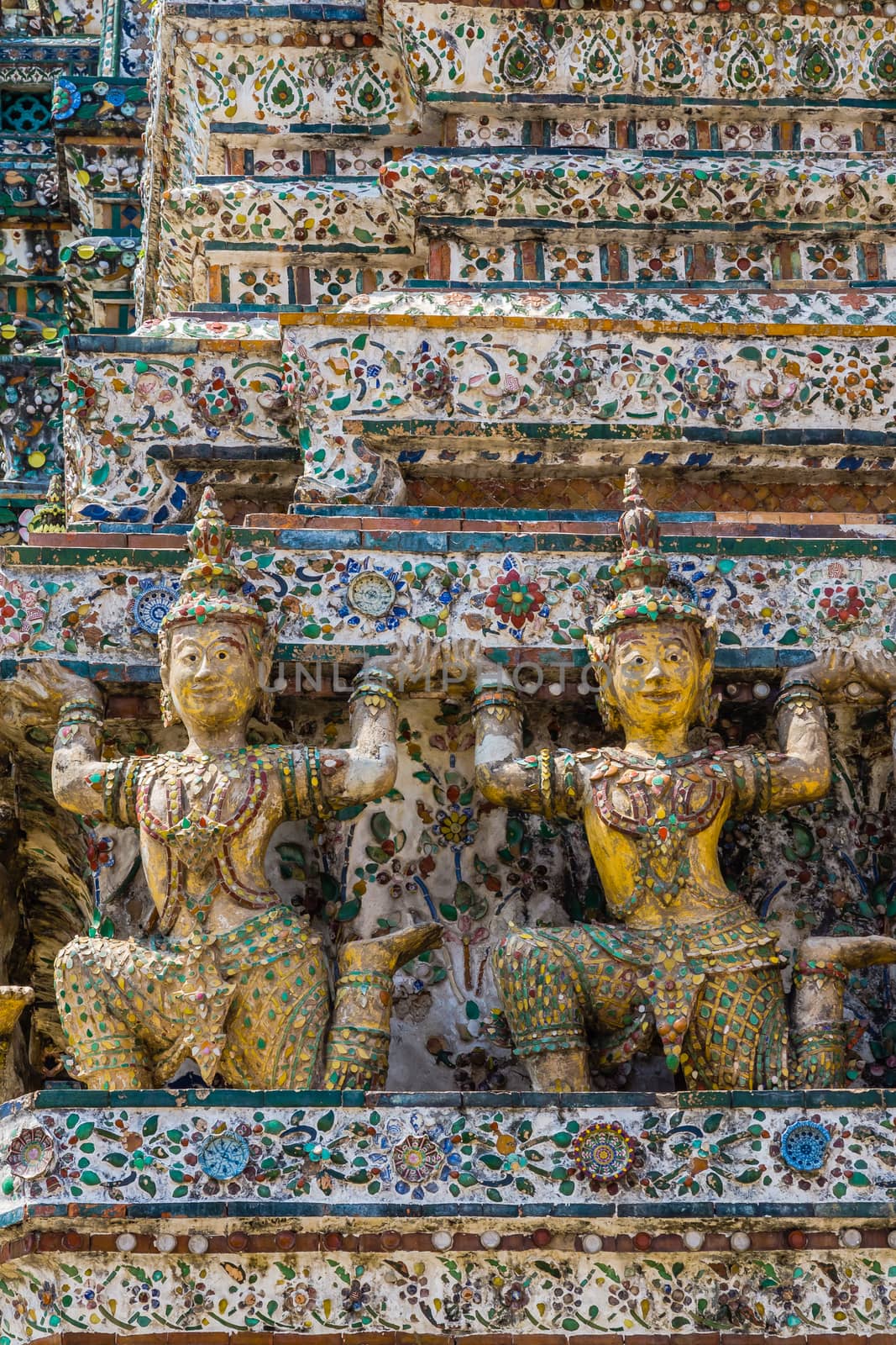 Architectural details on the facade of Wat Arun, Temple of Dawn in Bangkok, Thailand.