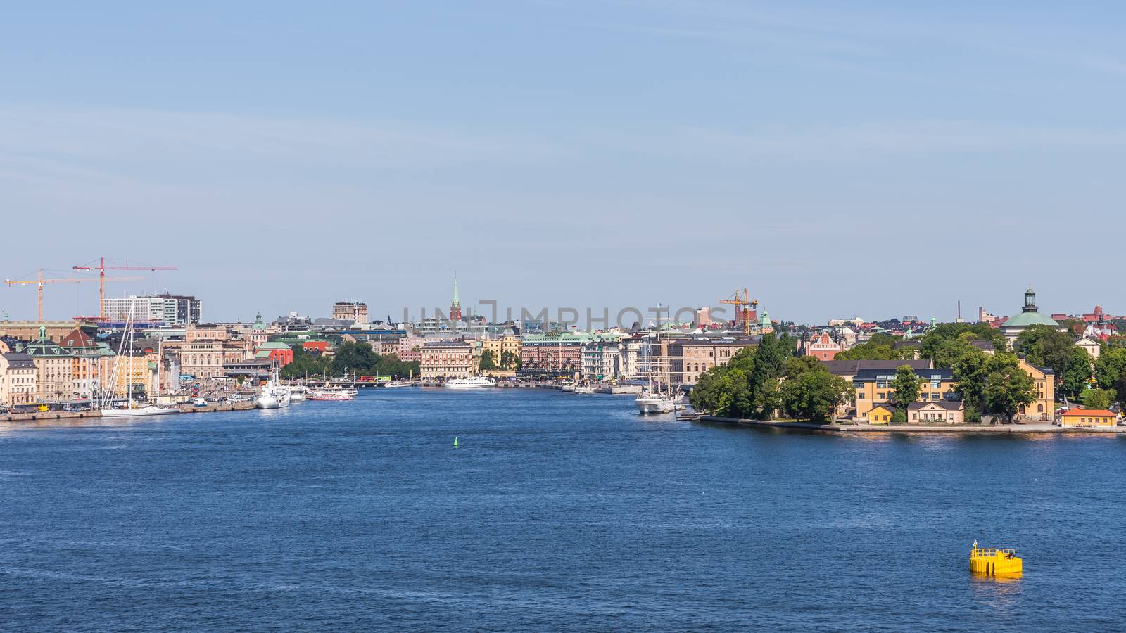 Cityscape with the Skeppsholmen islet on the right and The Old Town dating back to the 13th century on the left. Town has a rich collection of medieval architecture.