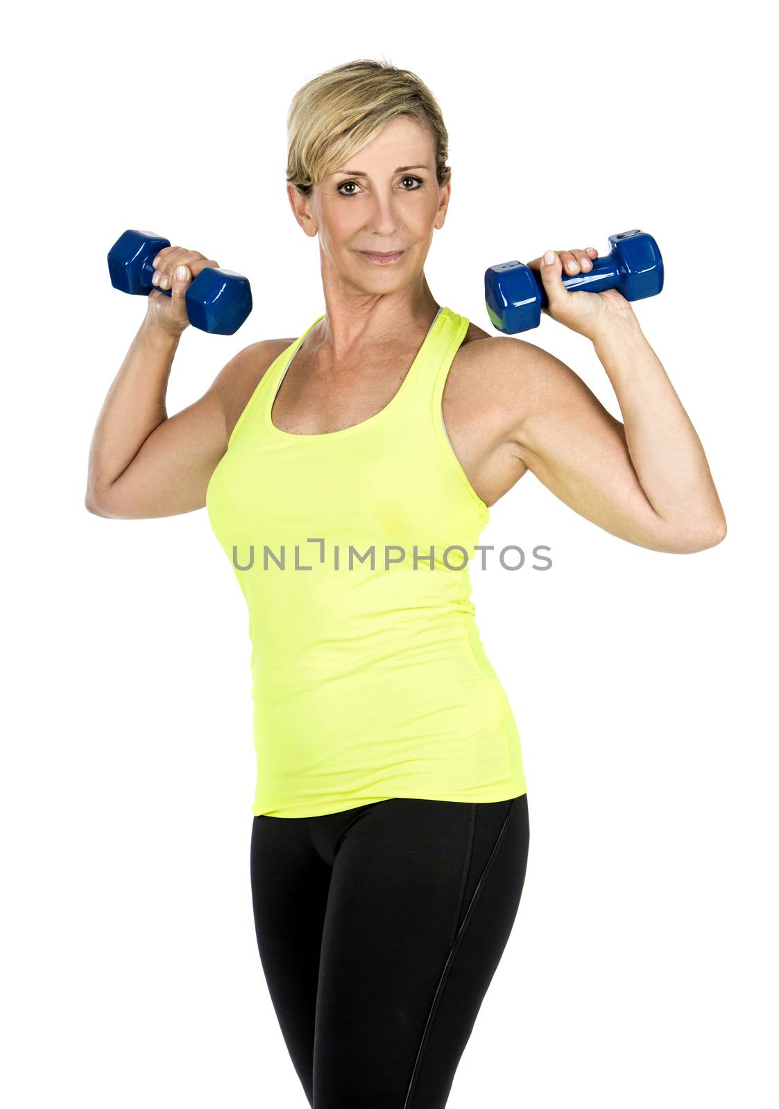 woman doing arms exercises with dumbbell by Flareimage