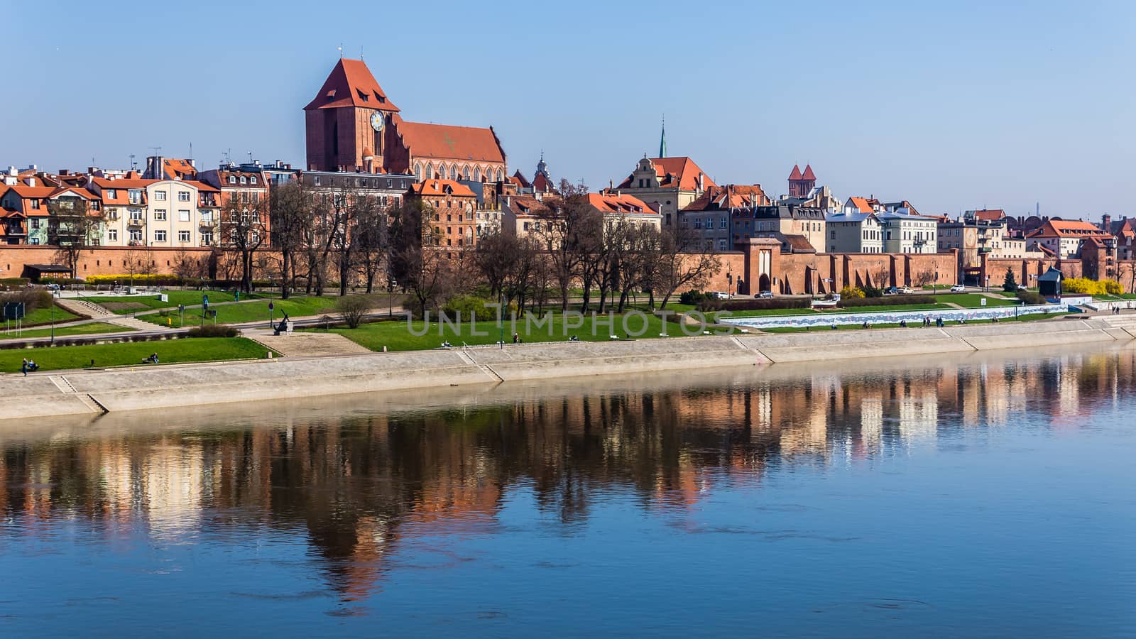 Panoramic view of the old town of Torun, Poland, taken out of the bridge over Vistula river. The Medieval Town of Torun is listed among UNESCO World Cultural and Natural Heritage sites.