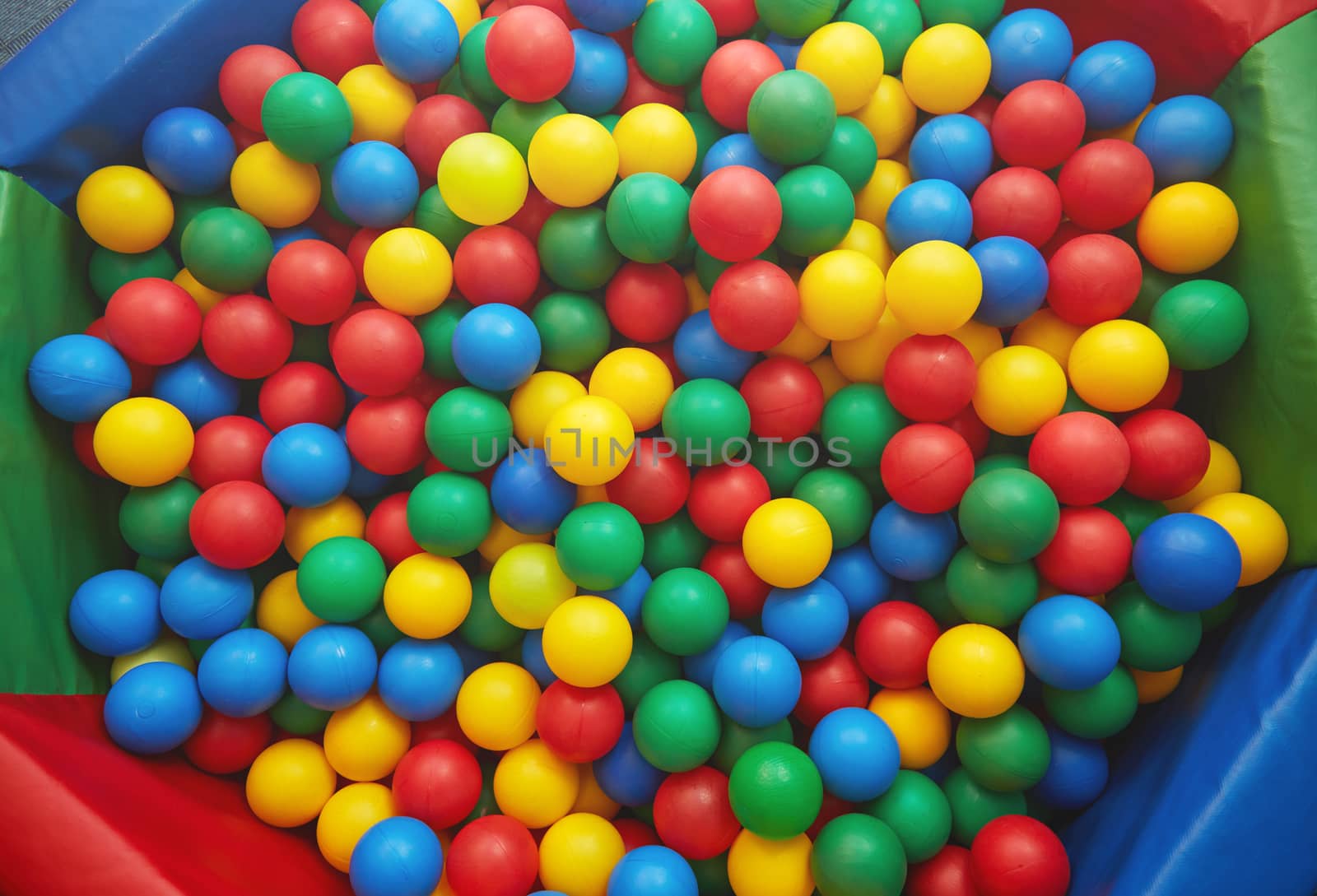 Group of many multicolored plastic balls. Close-up view