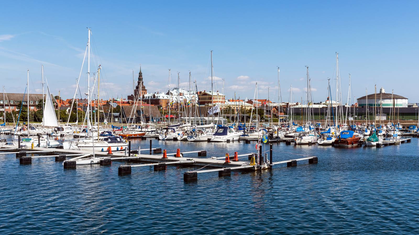 Marina and Ystad skyline. City founded in 11th century is a busy ferry port and the place of action of well-known novels by Henning Mankell with detective Wallander.