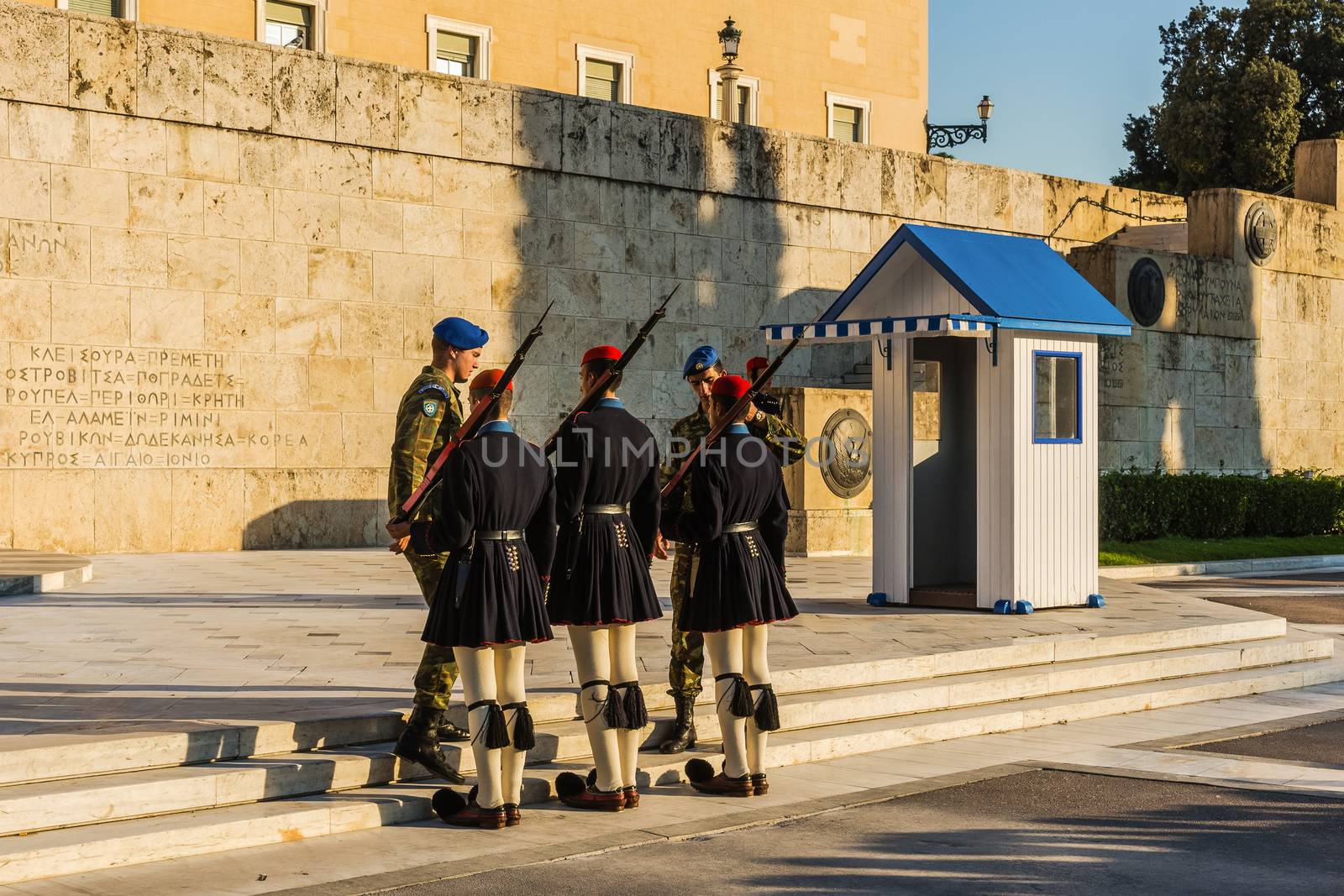 Changing of the guards at the Greek Tomb of the Unknown Soldier in Athens. The guard is held by The Evezones, a ceremonial traditionally uniformed unit of The Presidential Guard.