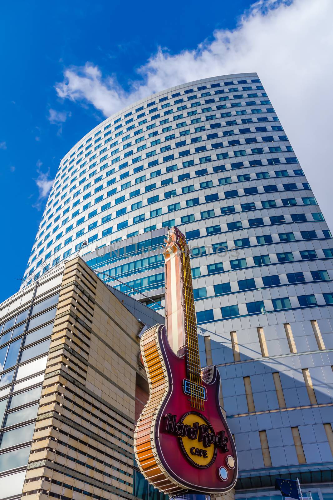 Golden Terraces in Warsaw, commercial and entertainment complex, on March 01, 2013. In the foreground  guitar, legendary symbol of Hard Rock Café which is situated at the street level.