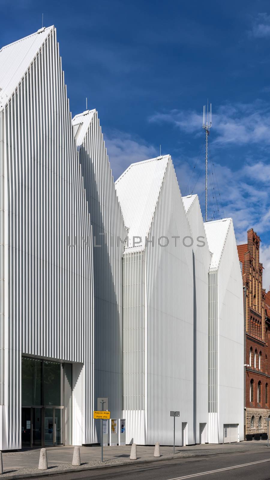 Facade of  The Szczecin Philharmonic Hall designed by Estudio Barozzi Veiga. Original building won the EU's architecture prize, the Mies van der Rohe Award 2015.