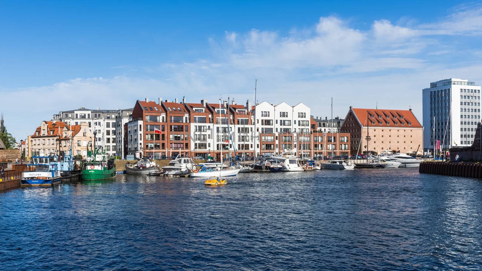 Harbor on the Motlawa river in Gdansk, the historical capital of Gdansk Pomerania and the largest city of Kashubia region with a population near 460,000.