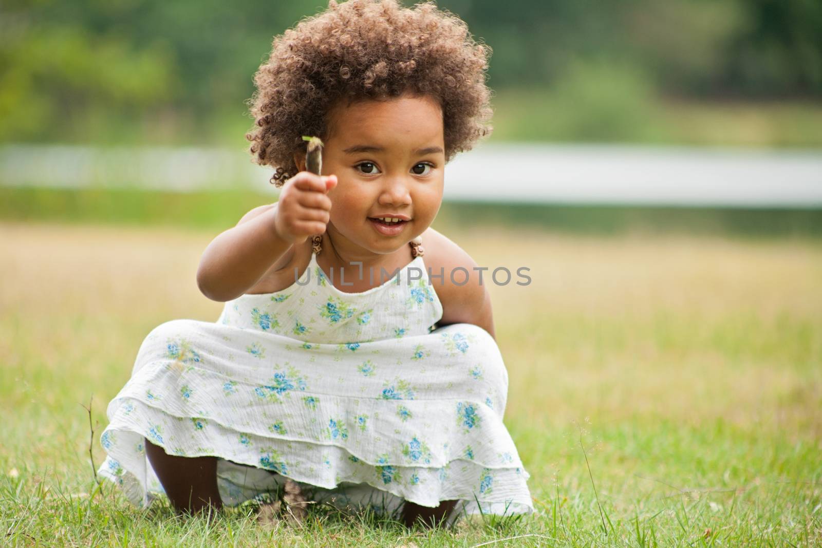 African young girl is having fun outside