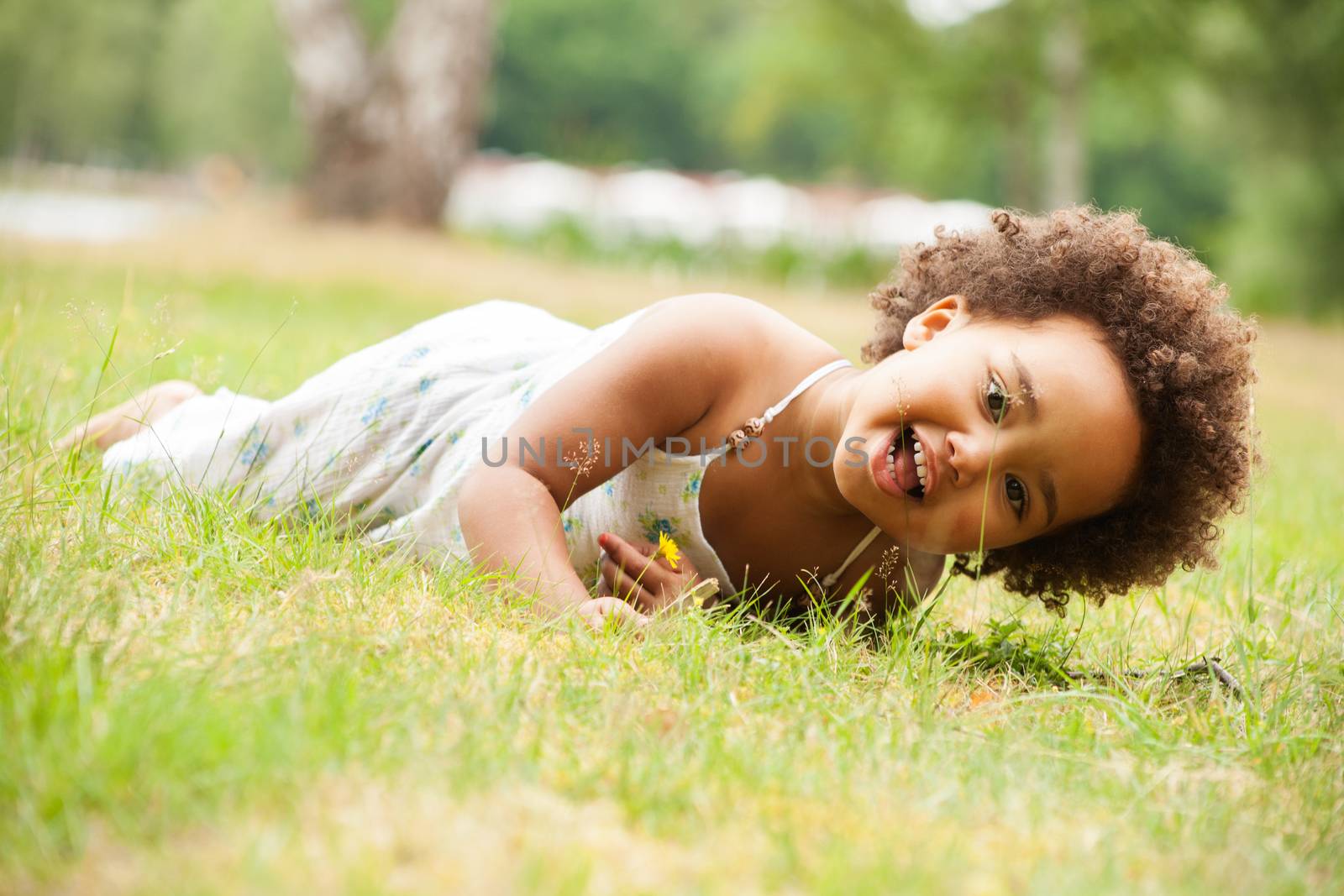 African young girl is having fun outside