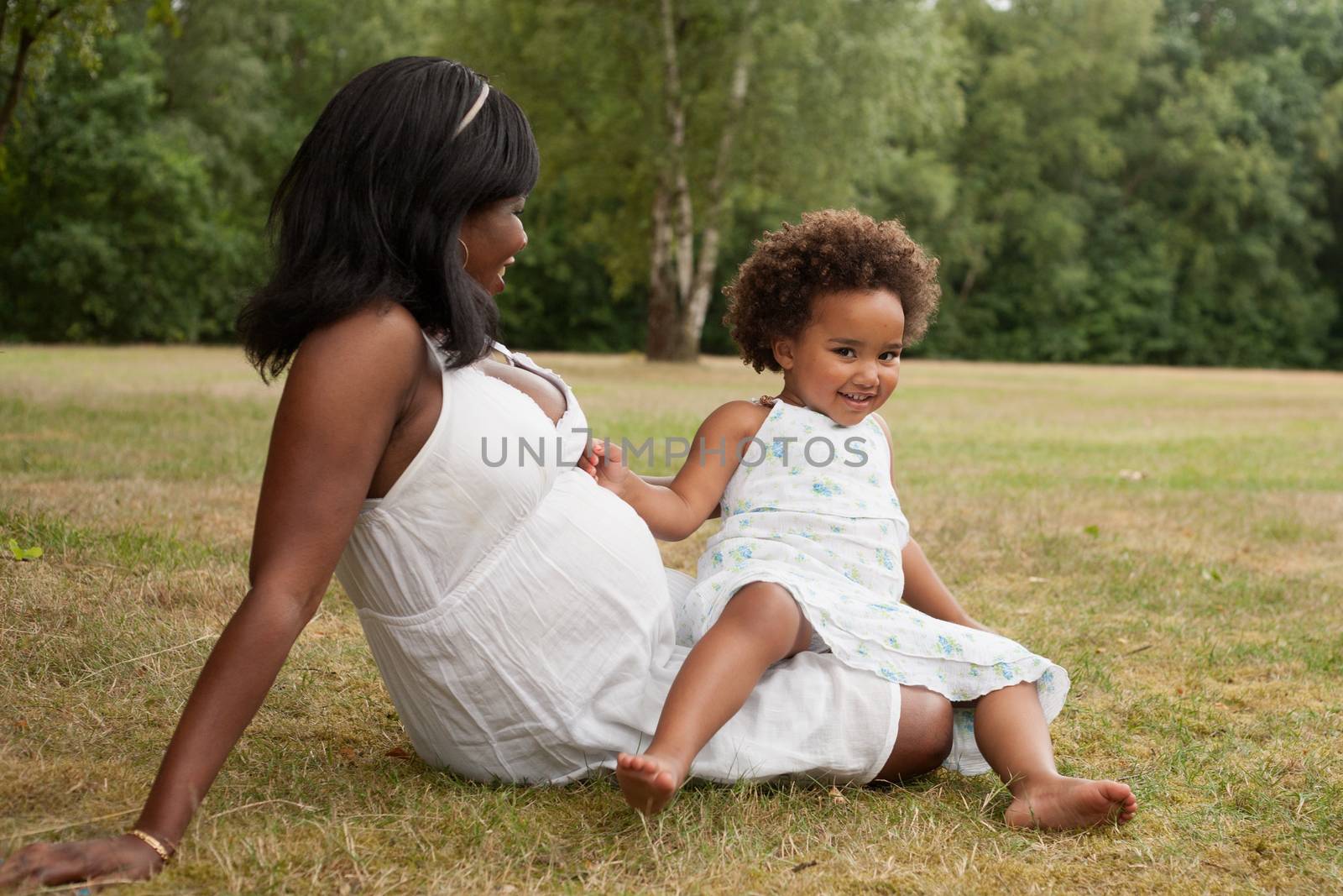 African mother and child are playing by DNFStyle