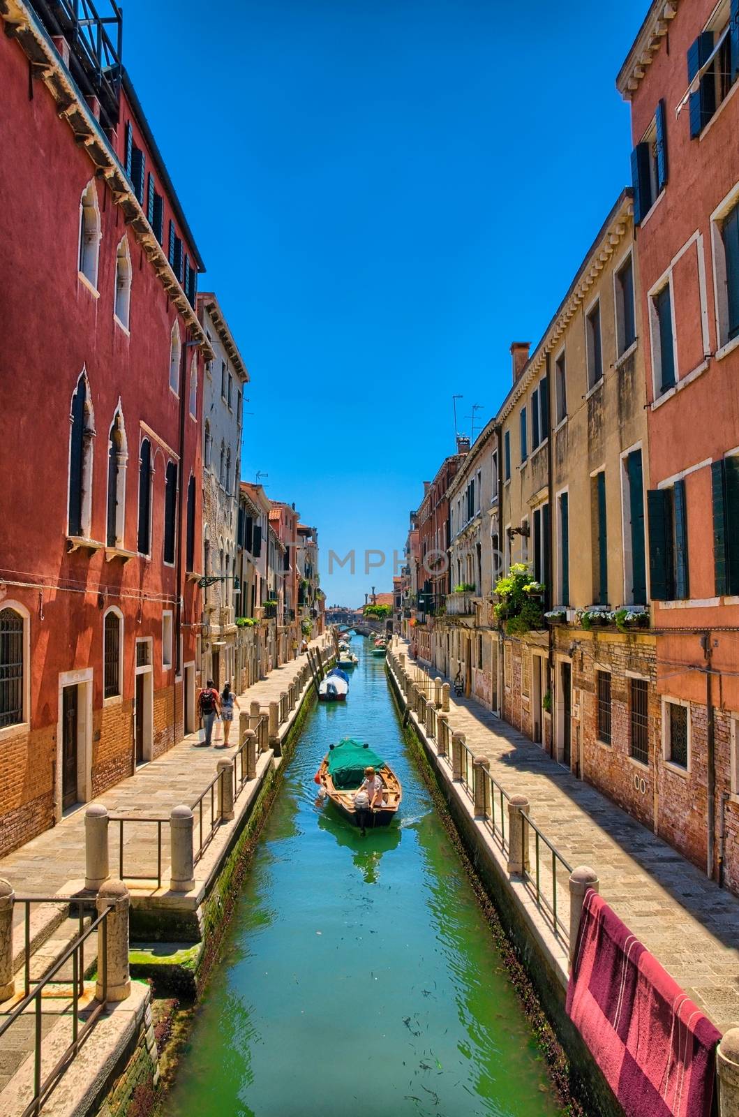 Scenic canal with boats, Venice, Italy, HDR