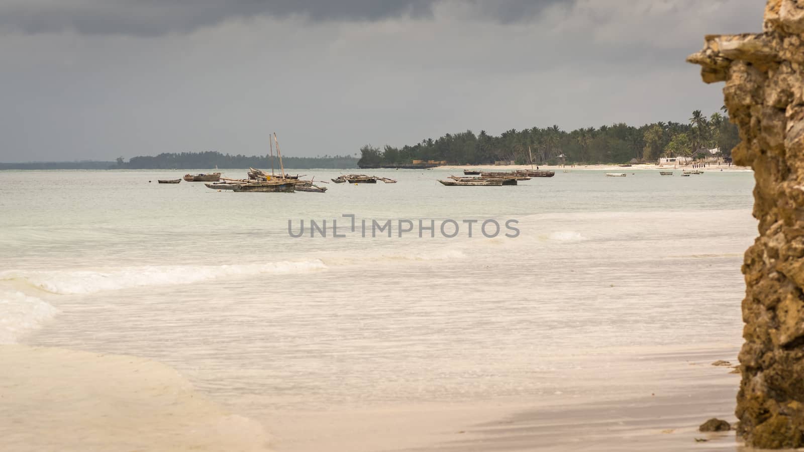 Pictured fishing ships anchored in the bay to the island of Zanzibar, Tanzania.