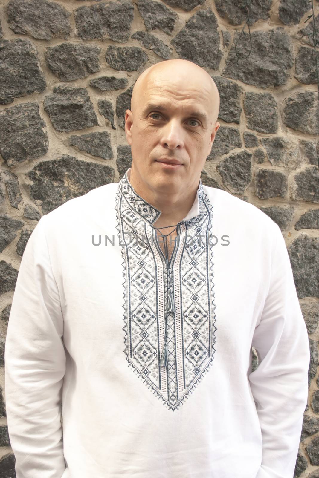 The man in the classic Ukrainian embroidered shirt. Folk Ukrainian style.