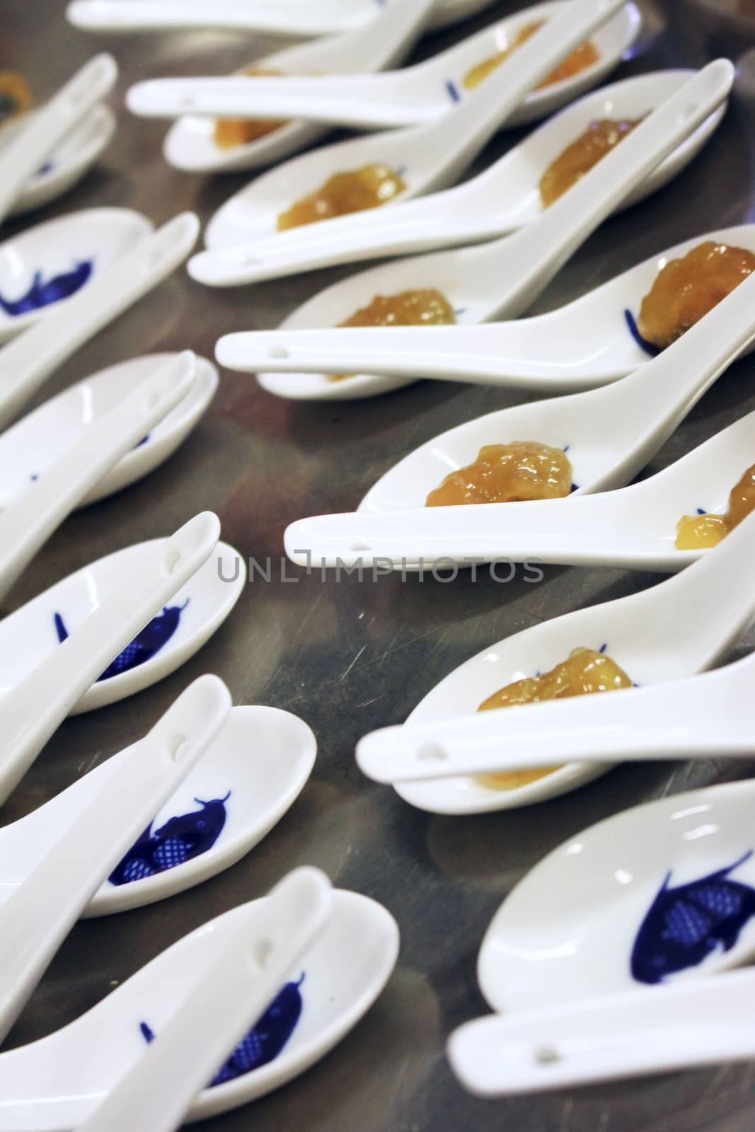 preparing canapes in kitchen