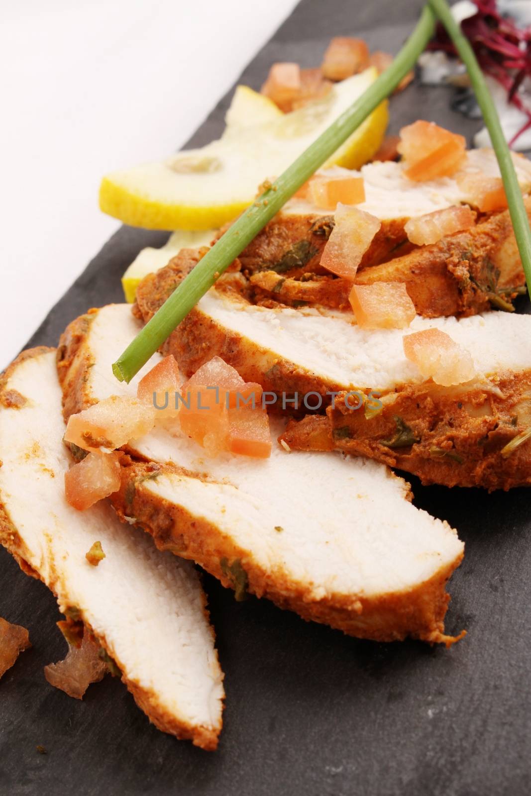 sliced chicken tikka by neil_langan