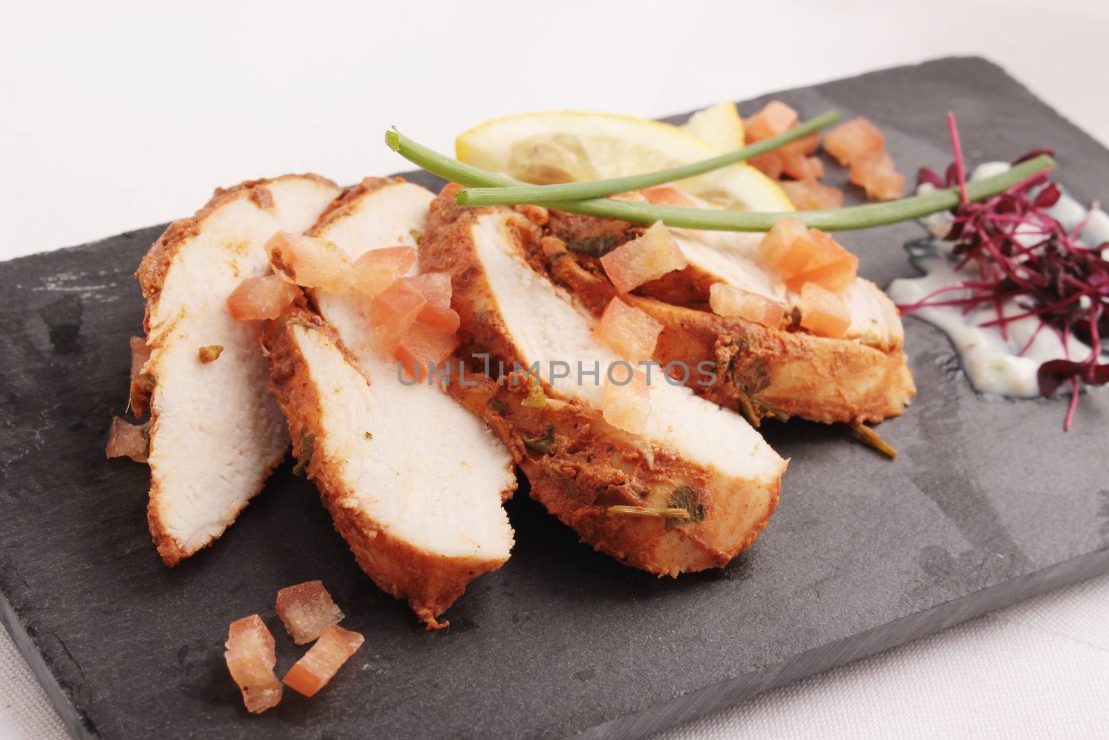 sliced chicken tikka by neil_langan
