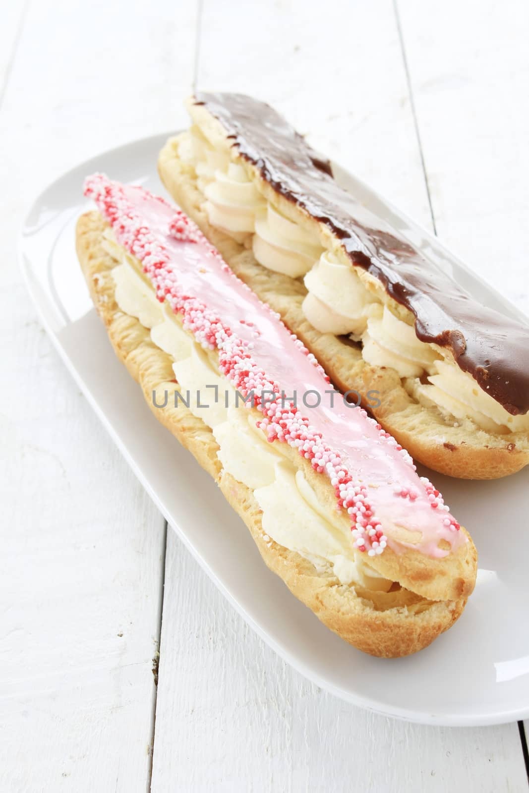larger chocolate eclaire pastries