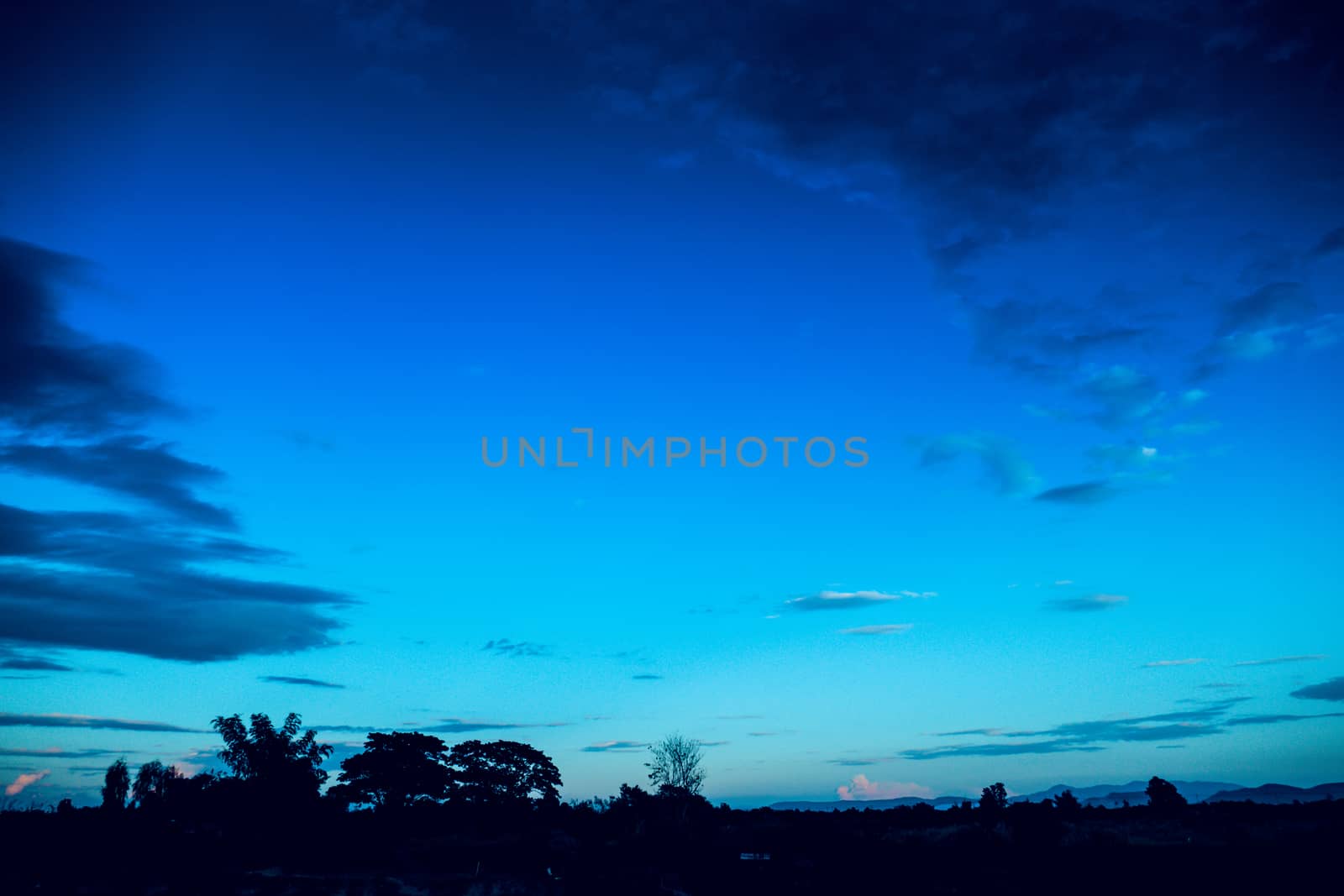 Cloudy blue sky abstract background by teerawit