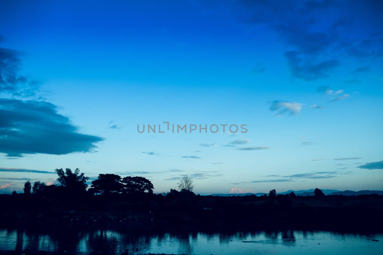 Cloudy blue sky abstract background by teerawit