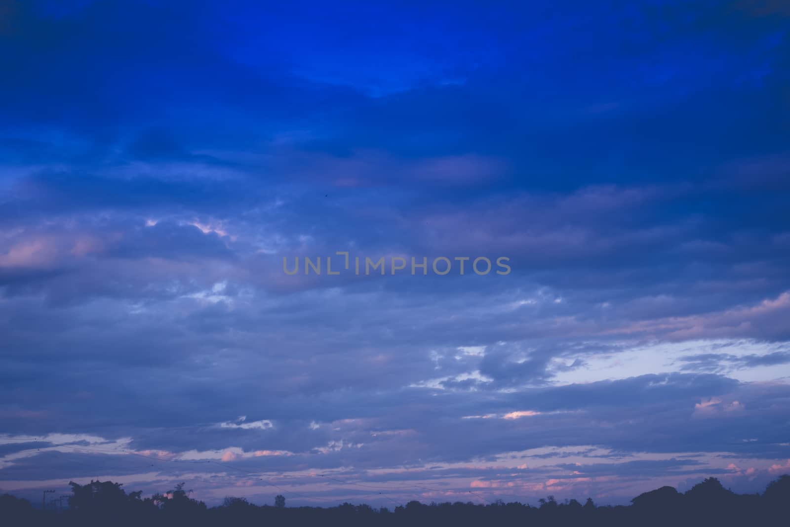 Cloudy blue sky abstract background by teerawit