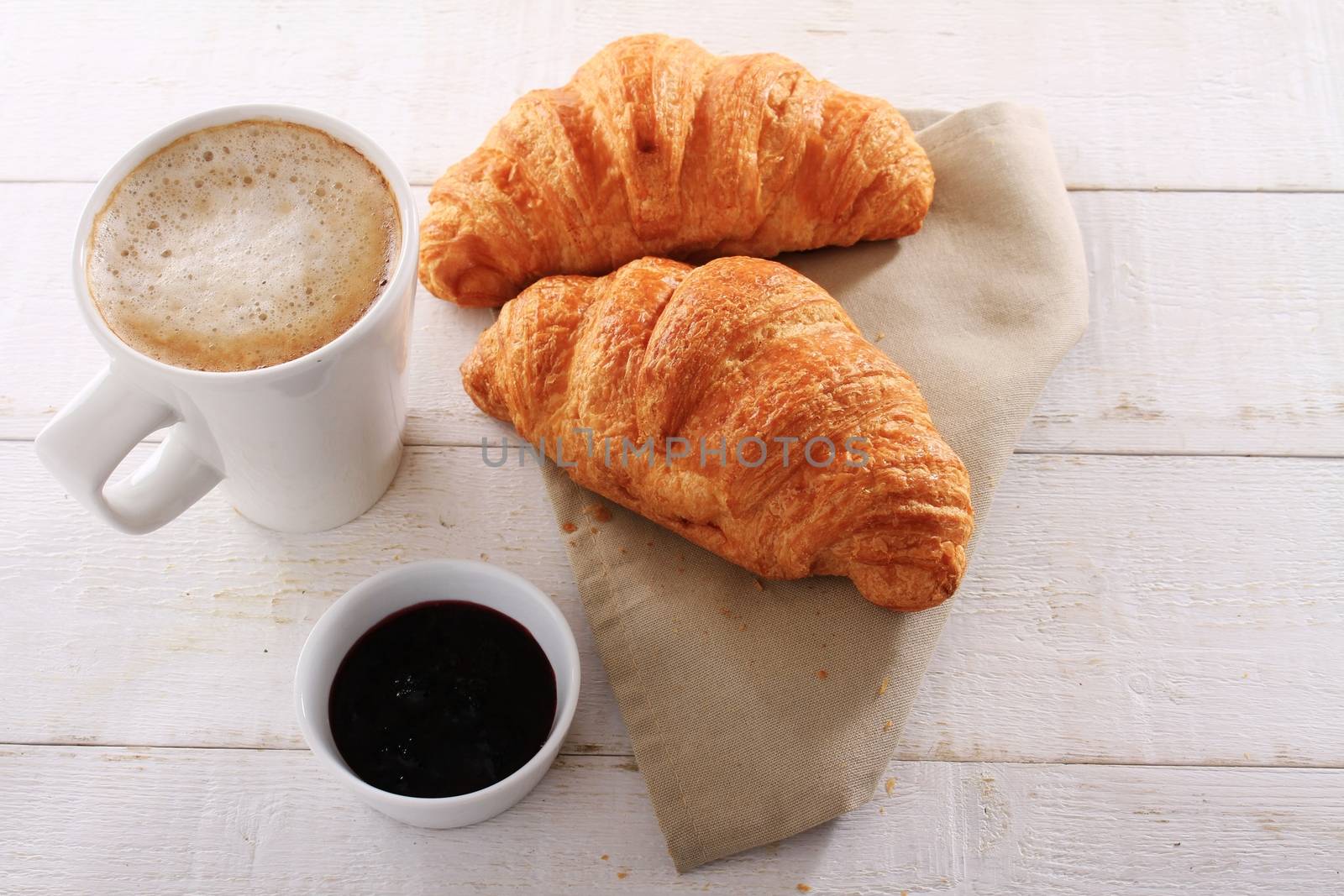 fresh baked croissant with coffee