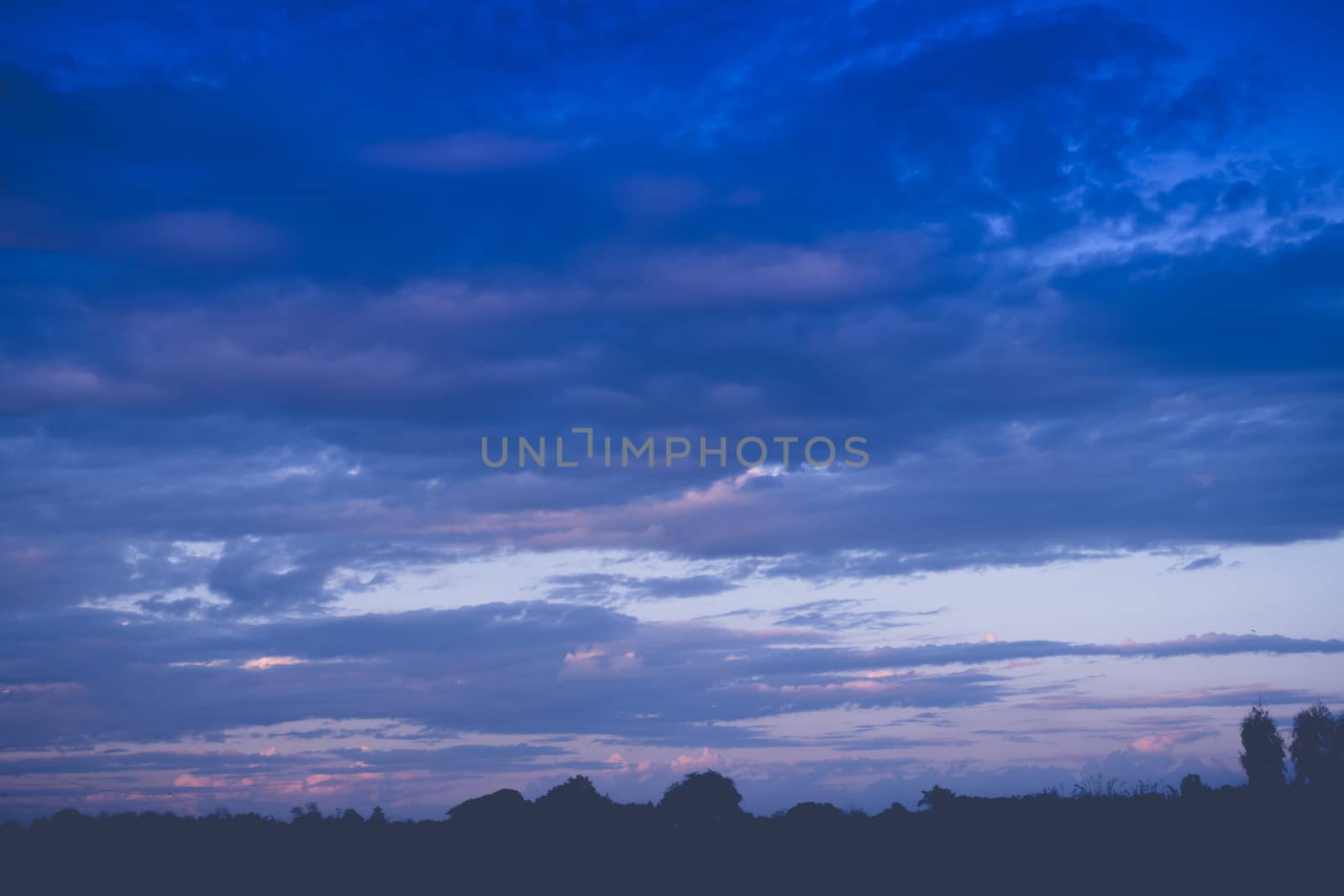 Cloudy blue sky abstract background by teerawit