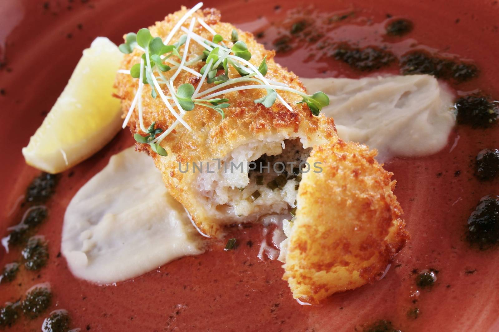 cod fish croquette plated meal