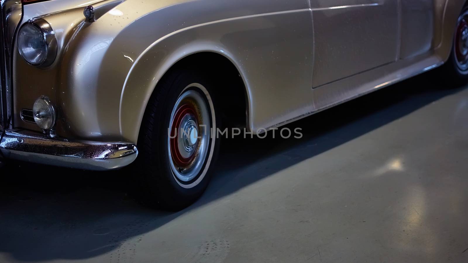 Detail of classic car. Close-up of headlight