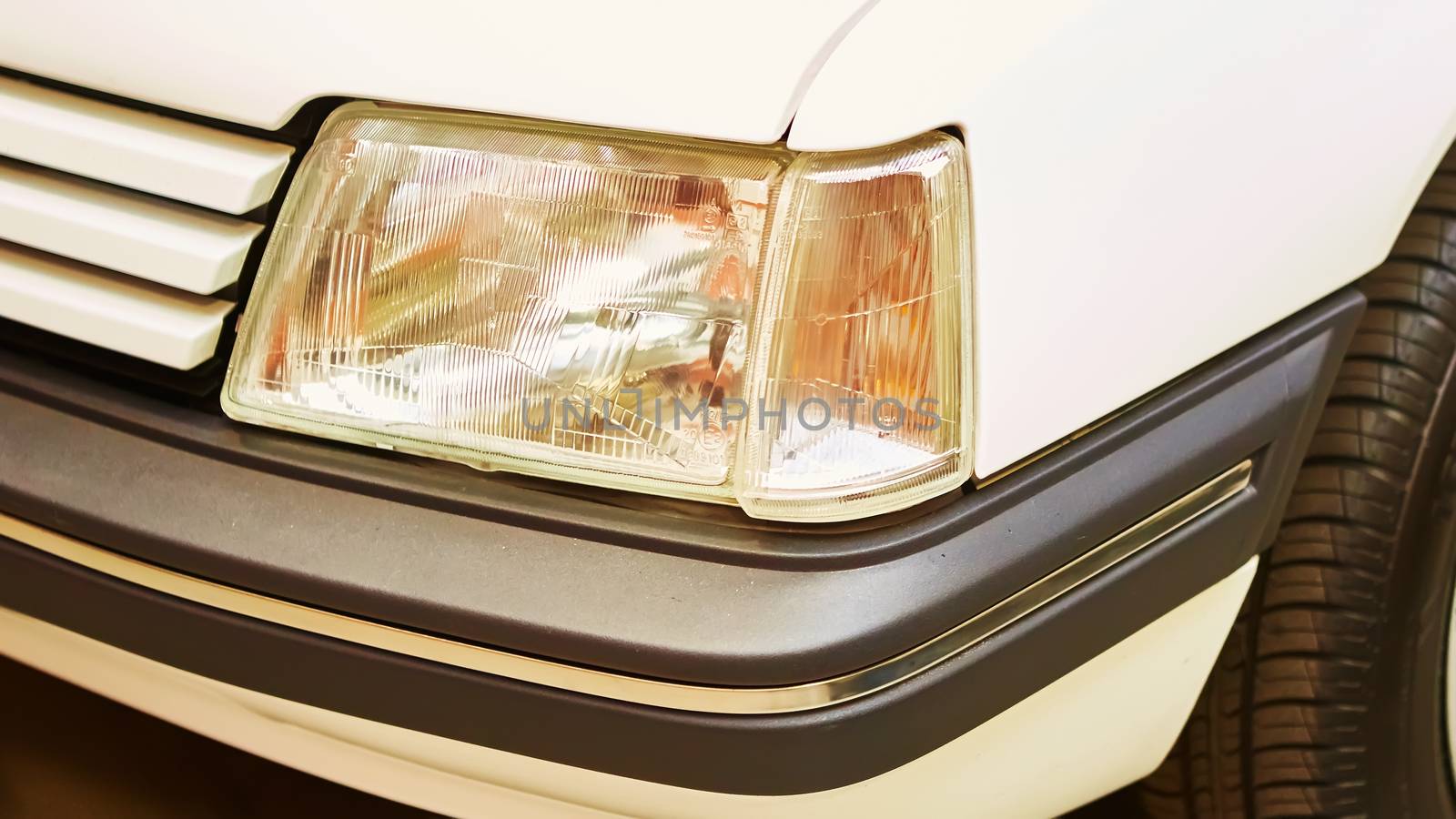 Detail of classic car. Close-up of headlight