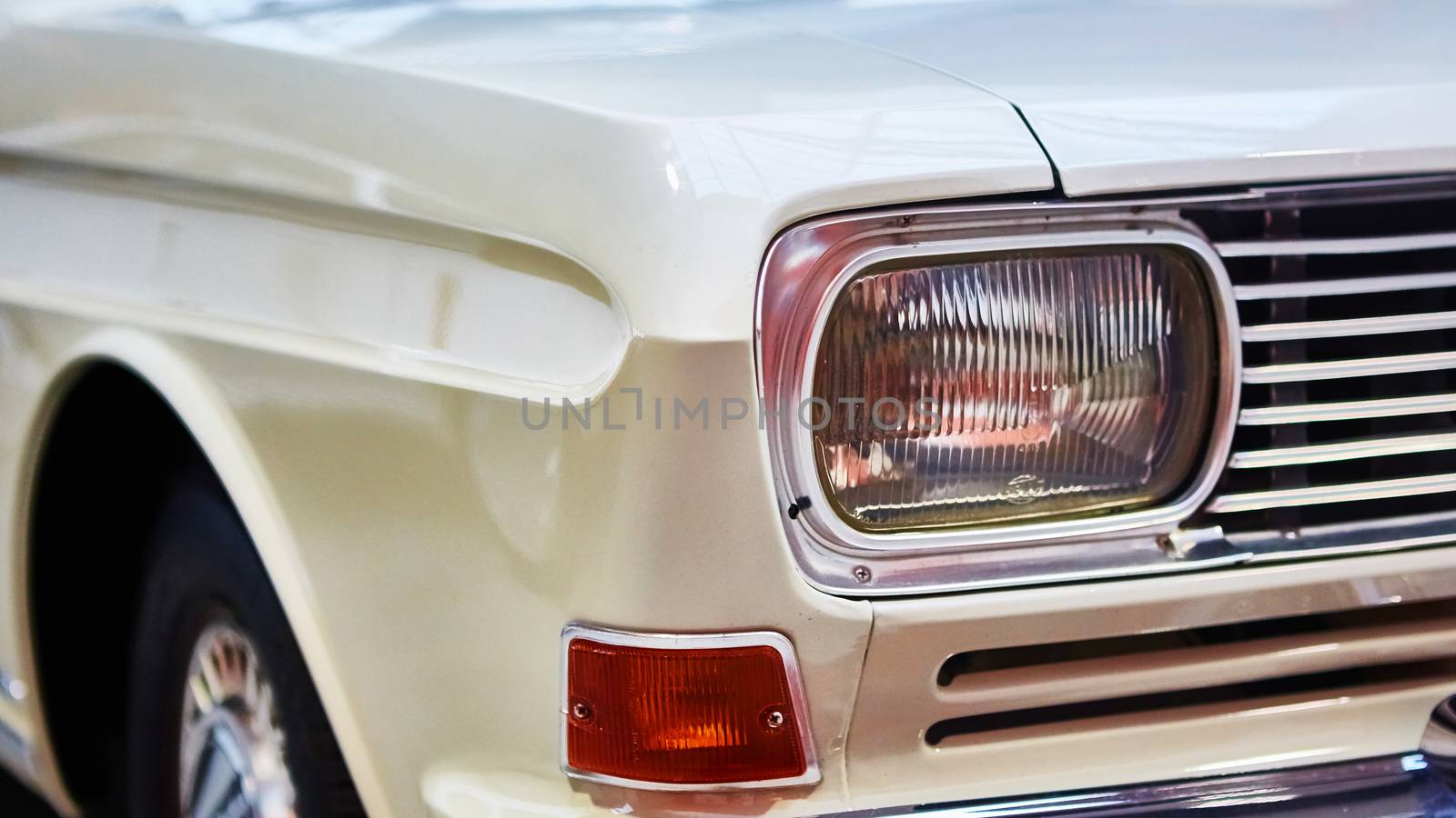 Detail of classic car. Close-up of headlight