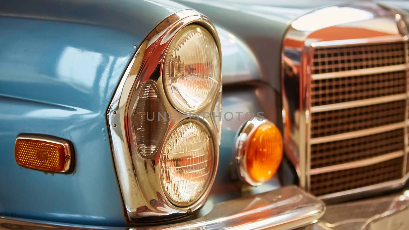 Detail of classic car. Close-up of headlight