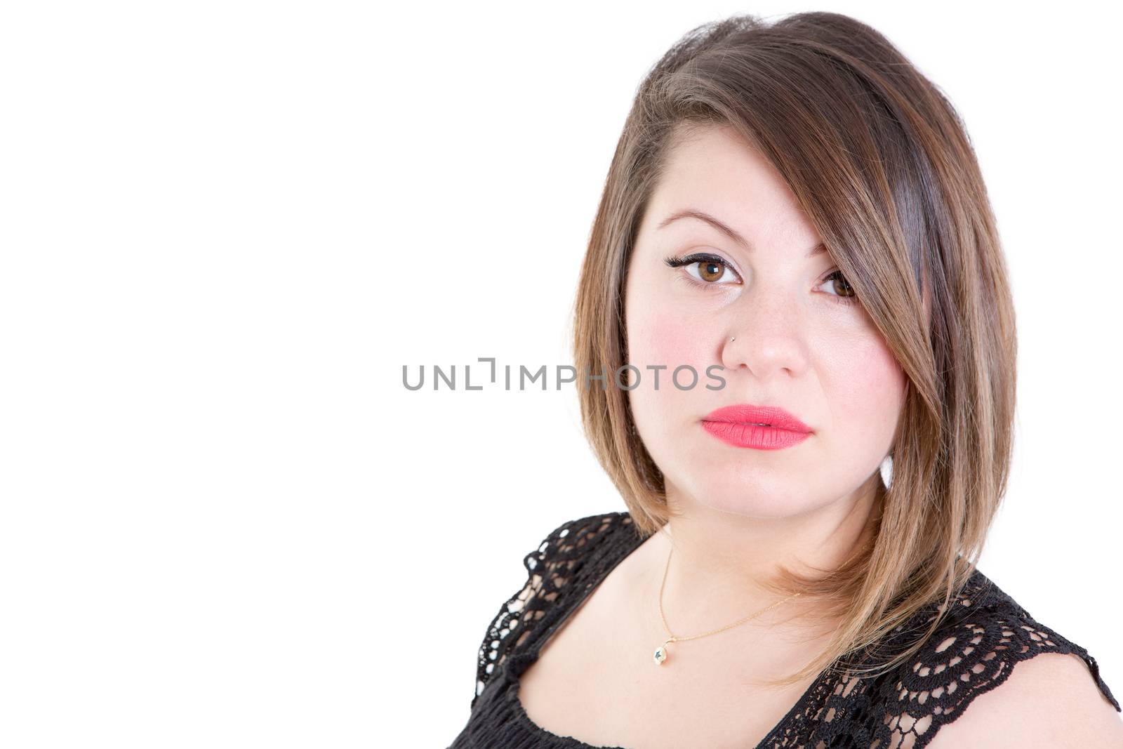 Close up Attractive Young Woman Staring at the Camera Against White Background with Copy Space.