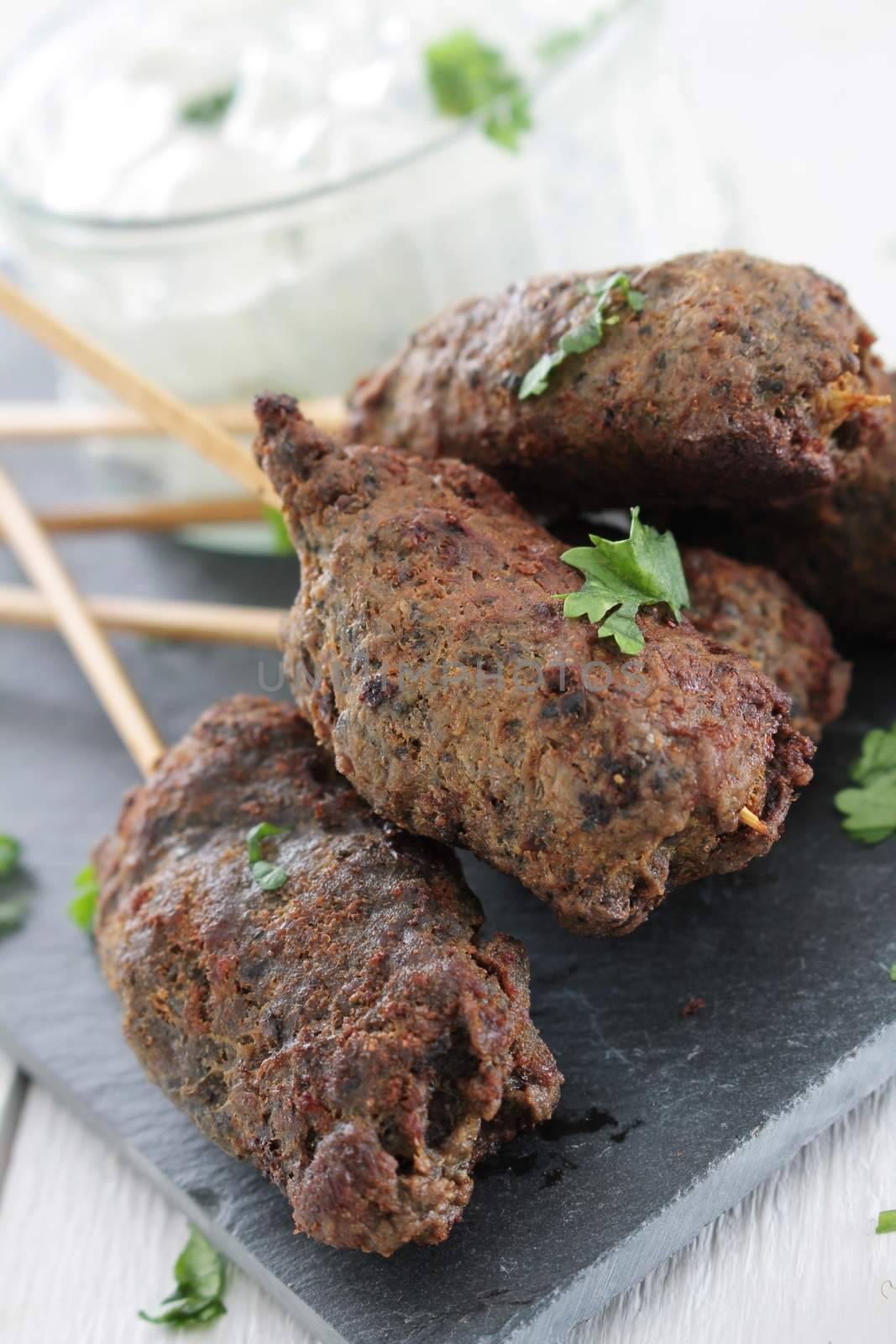 mini canape shish kofta kofte kebabs on platter