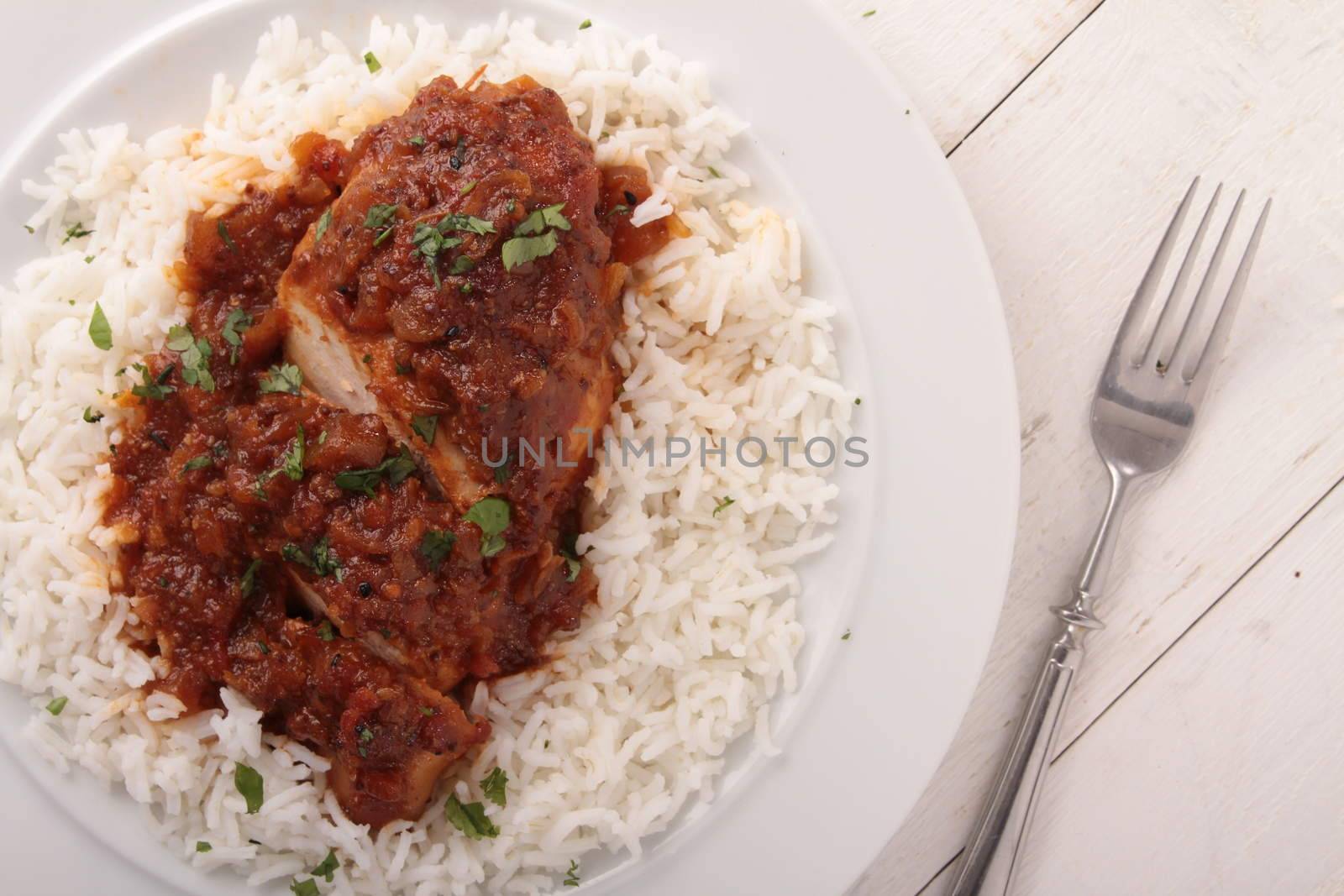 spicy chicken with rice dinner