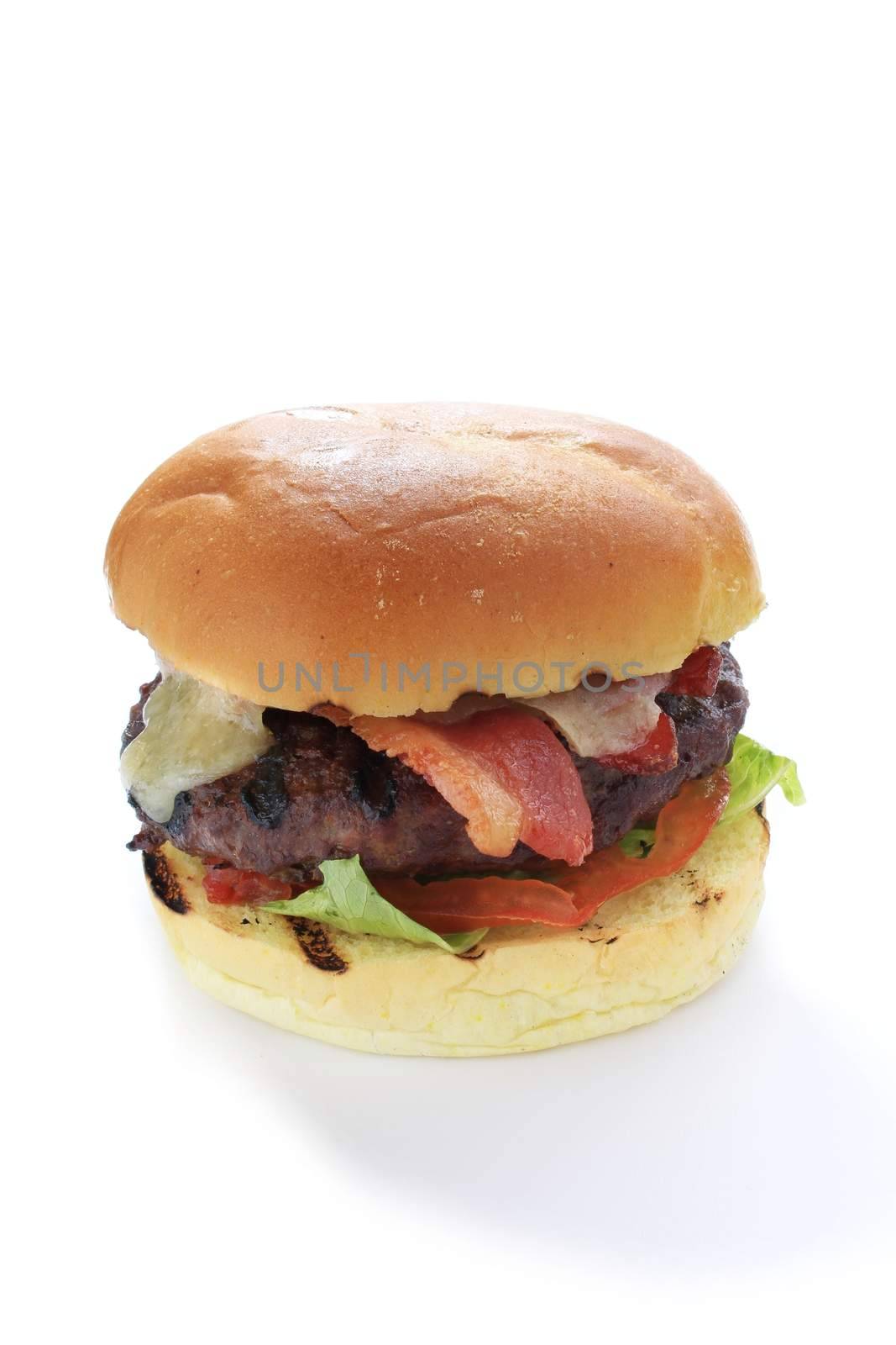 cbacon and cheese burger in brioche bun