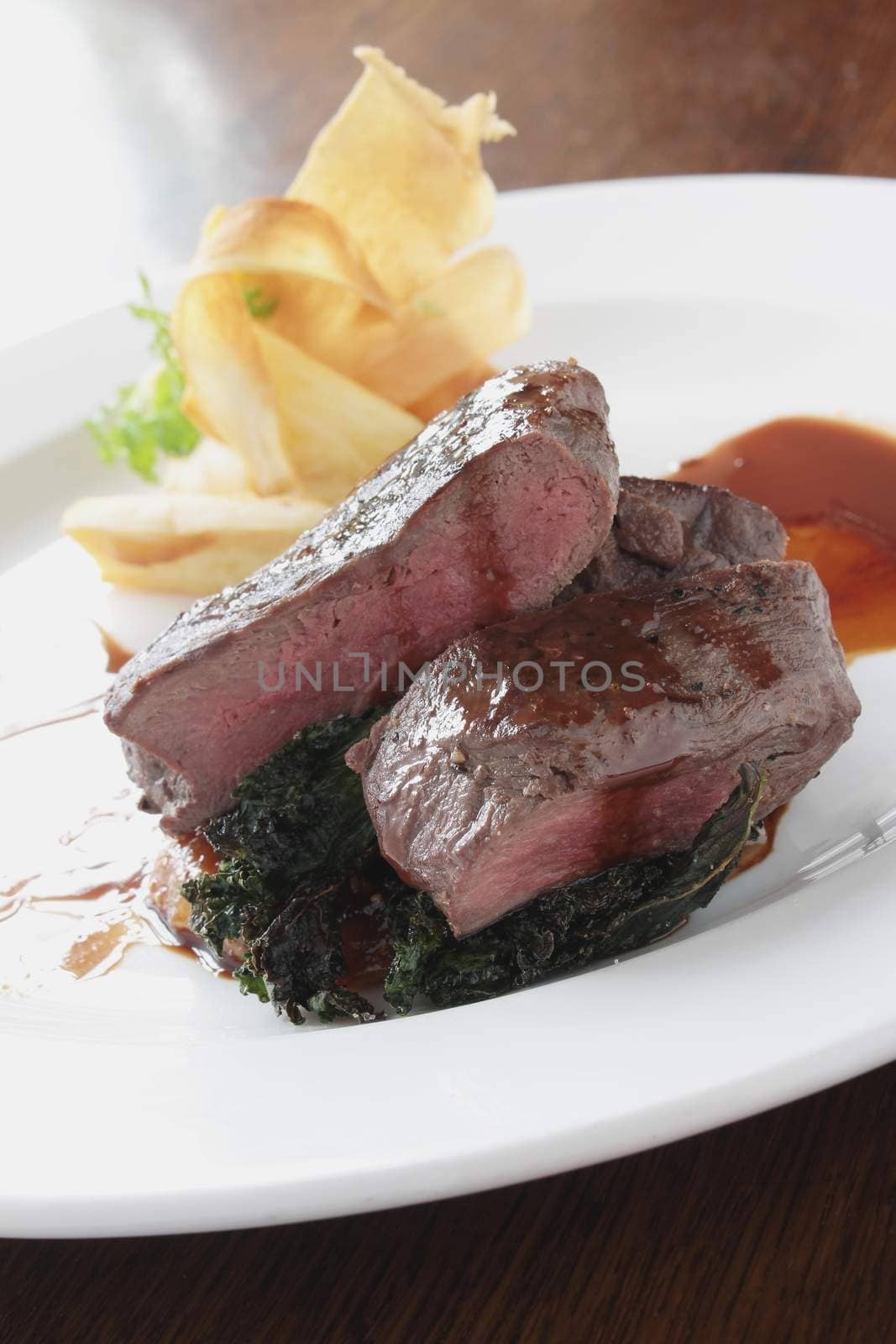 plated venison steak meal