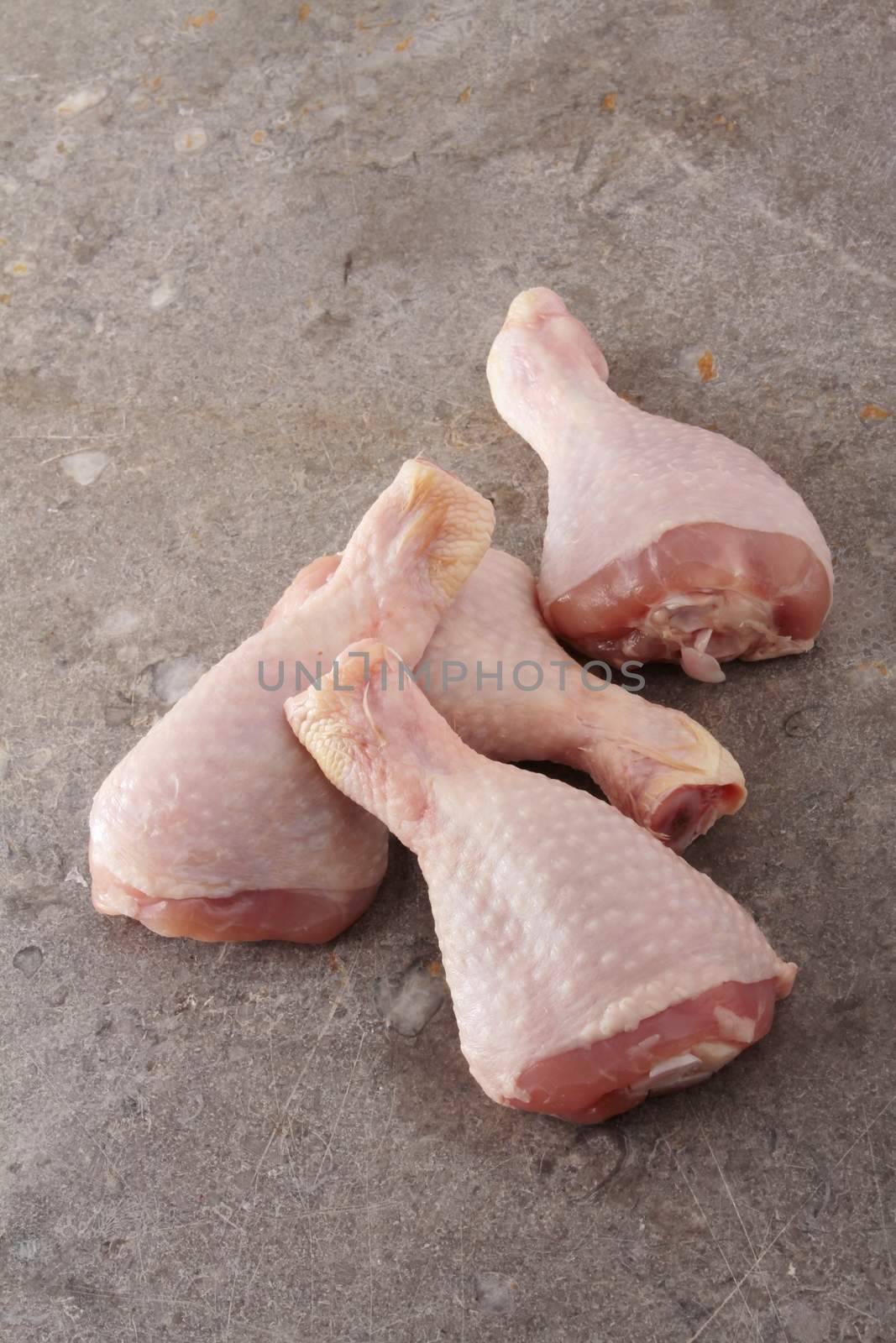 Raw chicken legs  by neil_langan