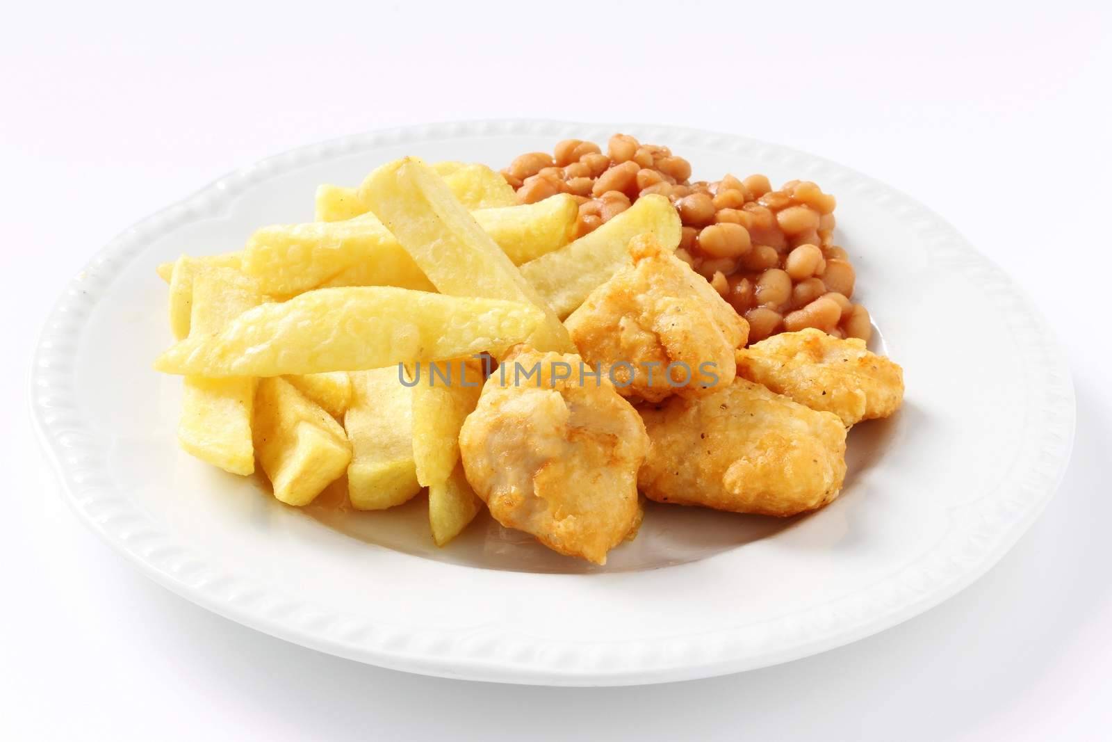 chicken nuggets with chips plated meal