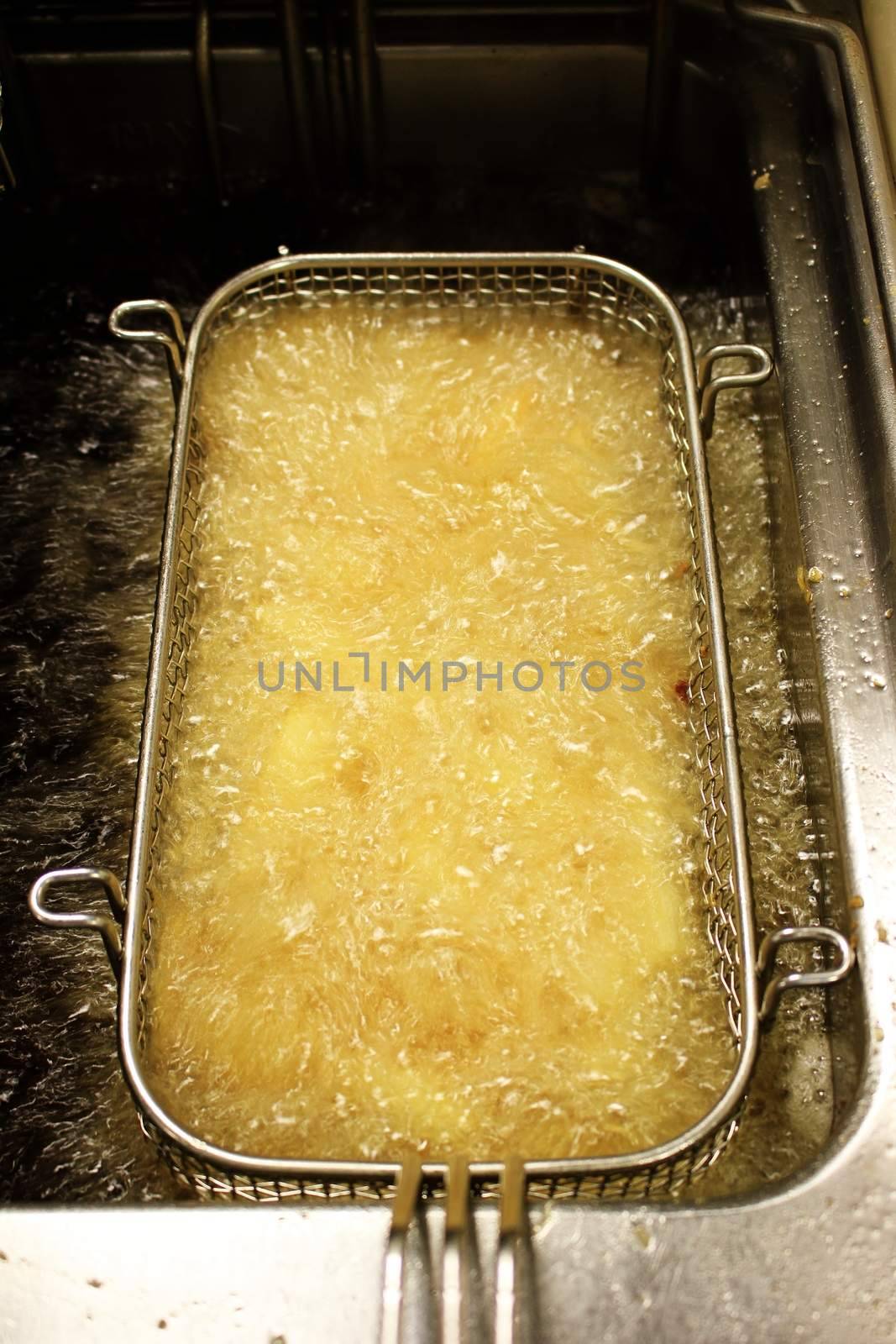 deep frying chipped potatoes